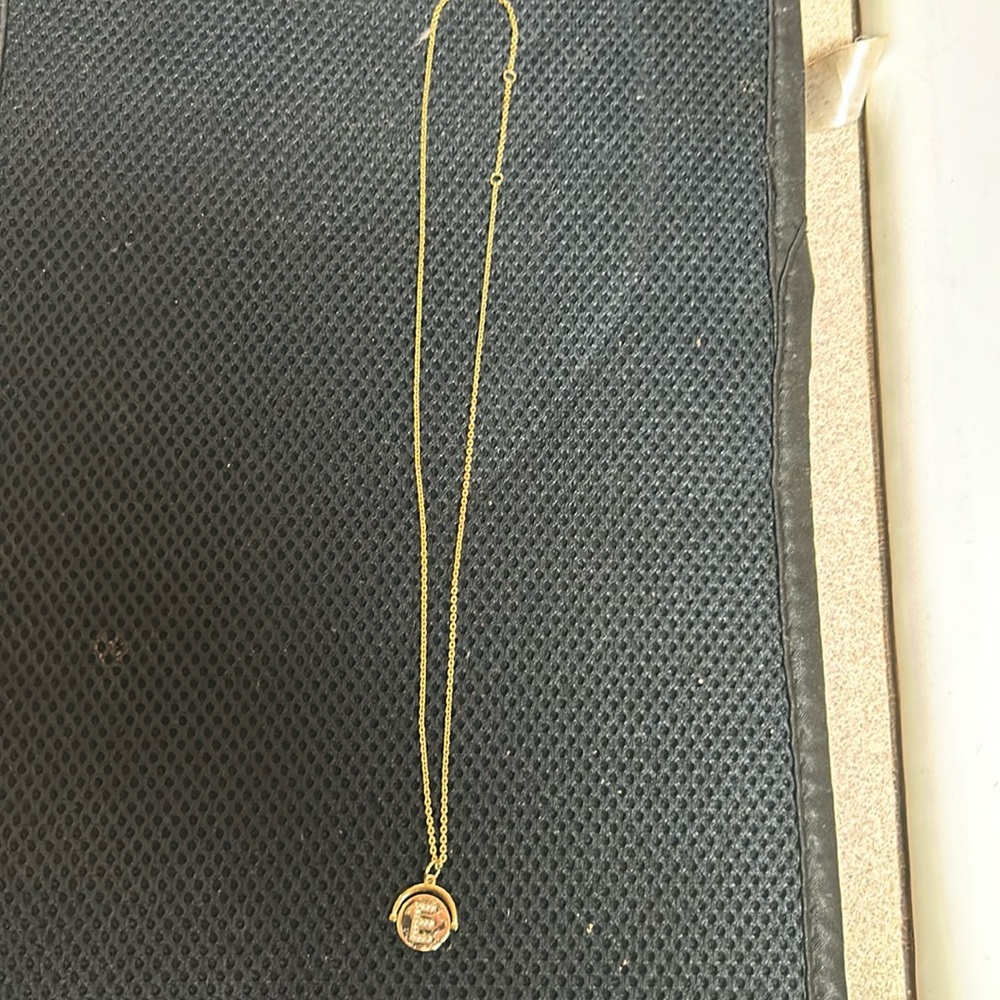 10 inch fashion jewelry necklace. With the E initial. Nice sturdy clasp.